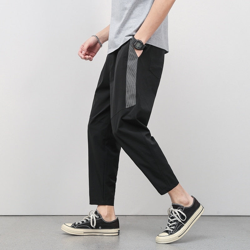 Korean Summer Men'S Thin Splicing 9-Point Pants Ice Silk Ventilation Trend Straight Tube Loose Elastic Legged Casual Trousers