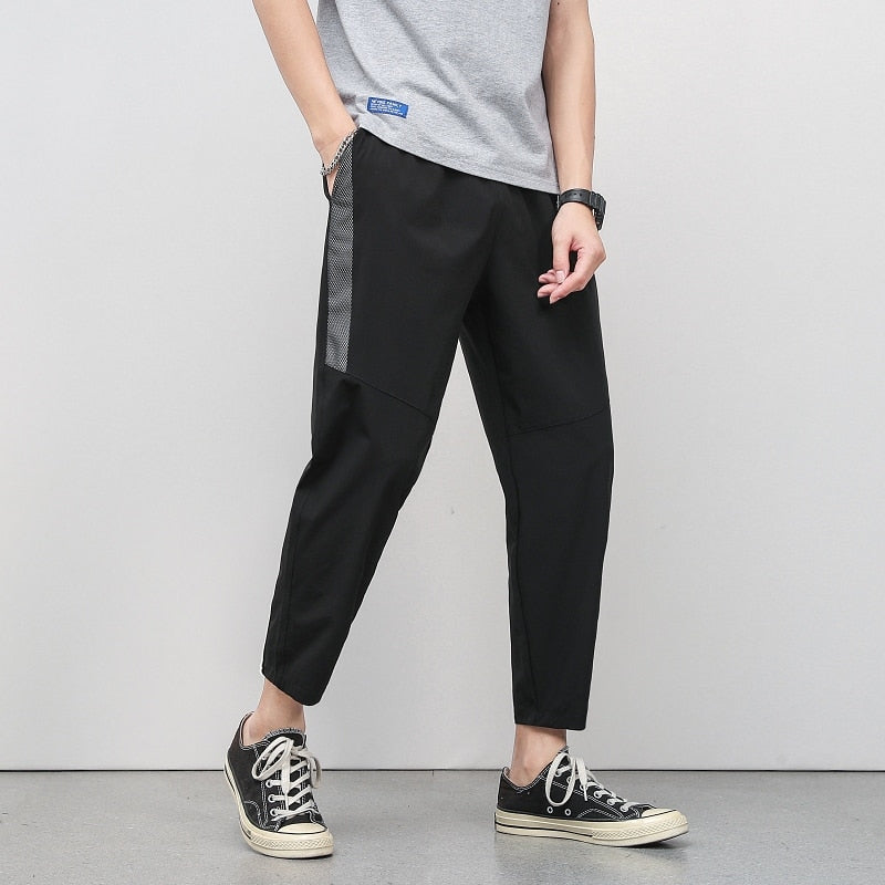 Korean Summer Men'S Thin Splicing 9-Point Pants Ice Silk Ventilation Trend Straight Tube Loose Elastic Legged Casual Trousers