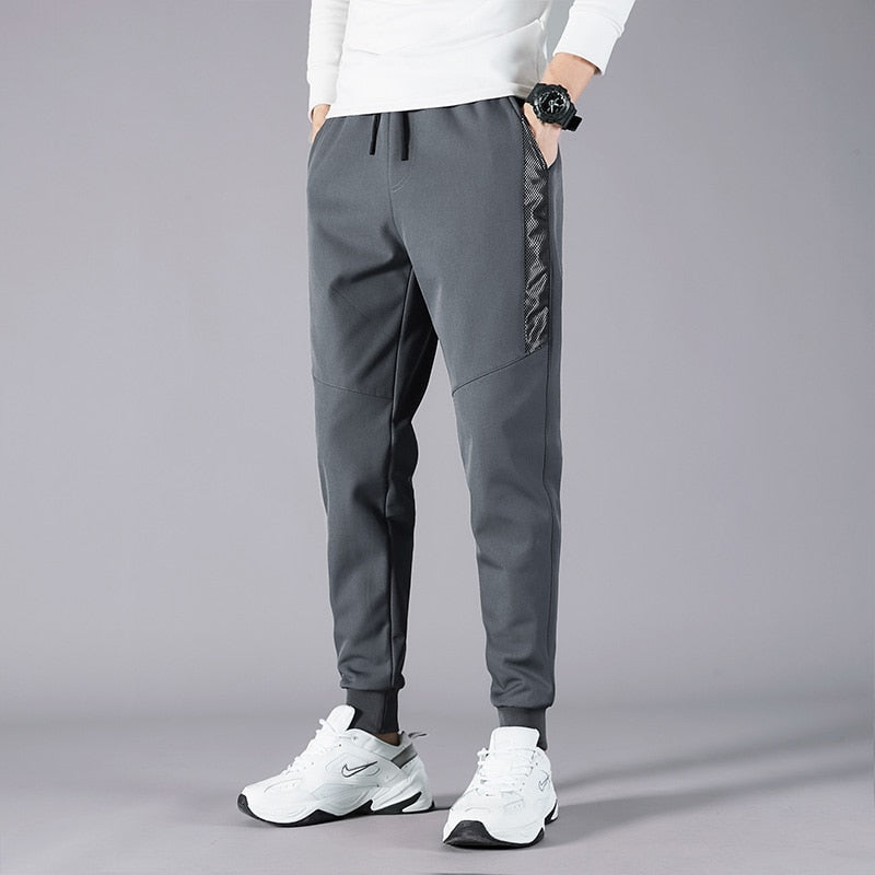 Korean Summer Men'S Thin Splicing 9-Point Pants Ice Silk Ventilation Trend Straight Tube Loose Elastic Legged Casual Trousers