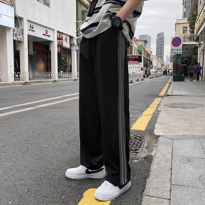 saferido Sportswear men's Korean fashion loose size straight pants man versatile side stripe feeling nine point casual pants sweatpants