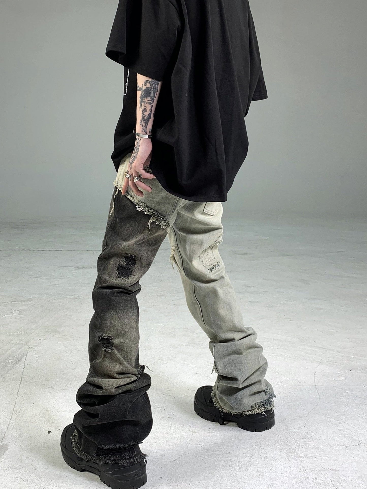 avant-garde and cutting-edge design, heterochromatic stitching, tattered beggar pants, with slight ruffled edges, and