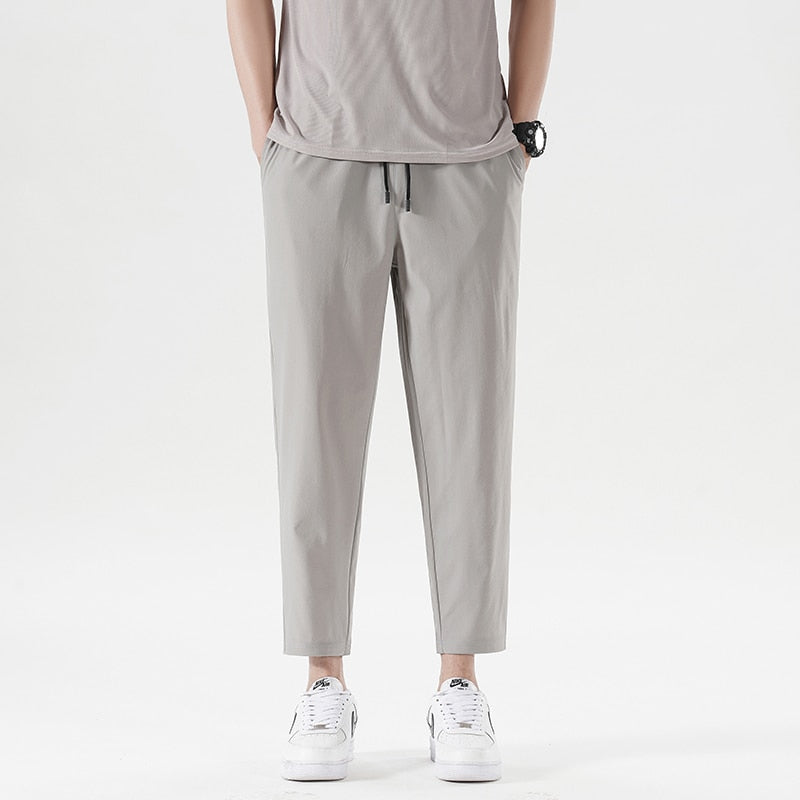 New Summer Men'S Casual Ice Silk Pants Korean Trend Loose Straight Tube Thin Harlan Trousers Quick Drying 9-Point Sweatpants