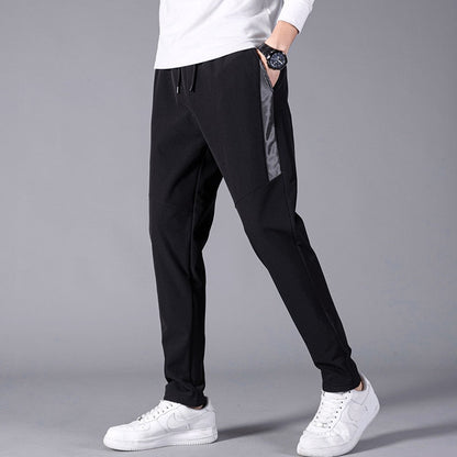 Korean Summer Men'S Thin Splicing 9-Point Pants Ice Silk Ventilation Trend Straight Tube Loose Elastic Legged Casual Trousers