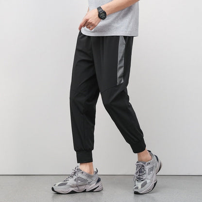 Korean Summer Men'S Thin Splicing 9-Point Pants Ice Silk Ventilation Trend Straight Tube Loose Elastic Legged Casual Trousers
