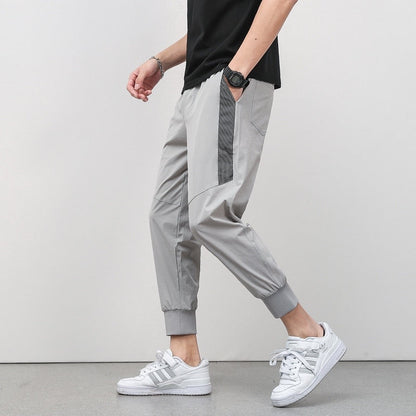 Korean Summer Men'S Thin Splicing 9-Point Pants Ice Silk Ventilation Trend Straight Tube Loose Elastic Legged Casual Trousers