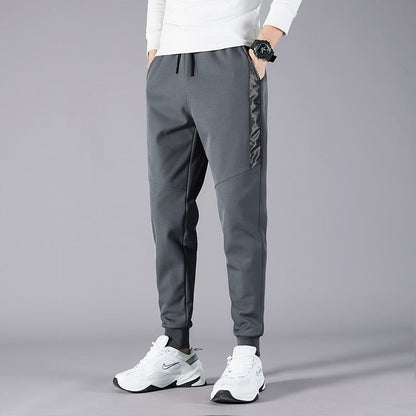 Korean Summer Men'S Thin Splicing 9-Point Pants Ice Silk Ventilation Trend Straight Tube Loose Elastic Legged Casual Trousers
