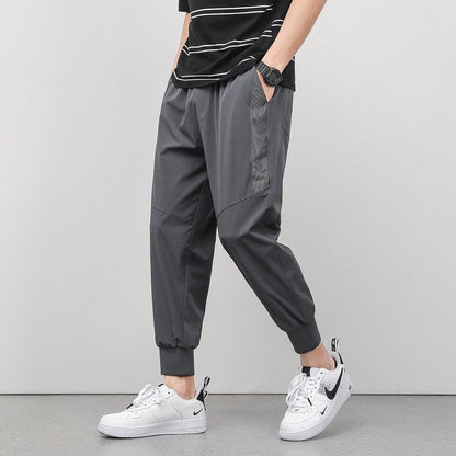 Korean Summer Men'S Thin Splicing 9-Point Pants Ice Silk Ventilation Trend Straight Tube Loose Elastic Legged Casual Trousers
